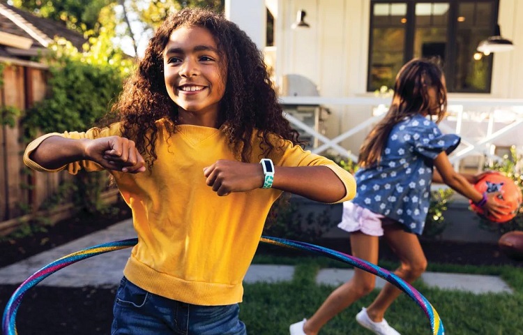 girl with tracker on wrist