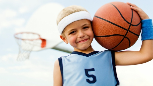 kid with basketball