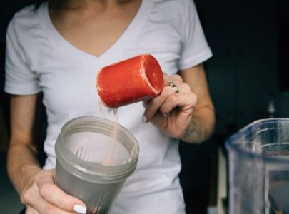 women making protein shake