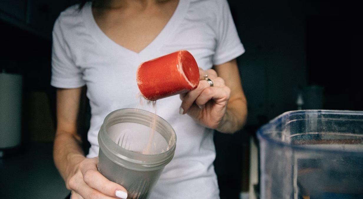 women making protein shake