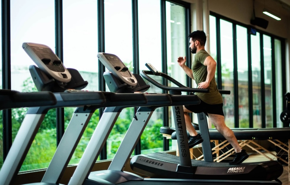 man running on treadmill